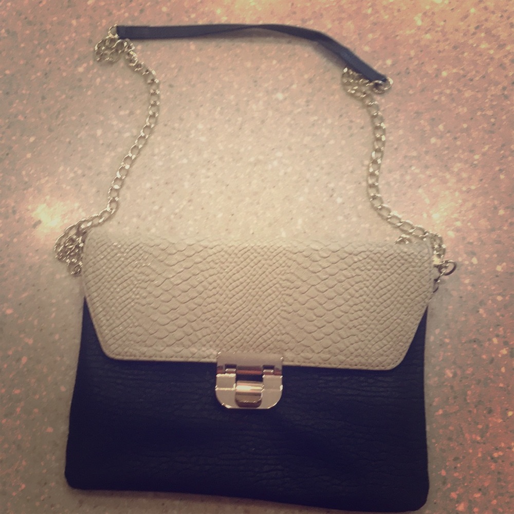 Black and cream with gold chain clutch purse
